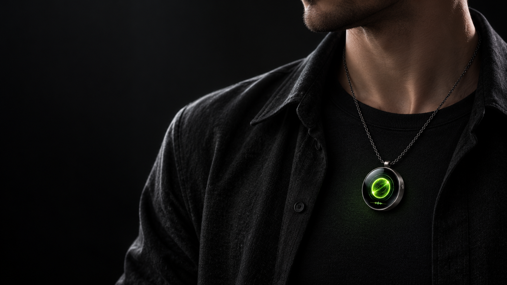 NOVA One worn over a black T-shirt, the green orb glowing on the round pendant